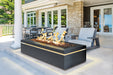 Halo 60 gas fire pit on a covered patio with modern outdoor seating.