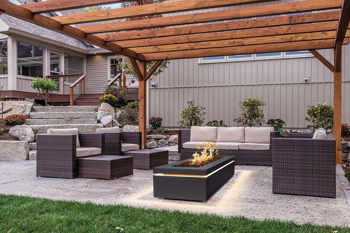 Halo 60 gas fire pit beneath timber pergola with cosy patio seating.