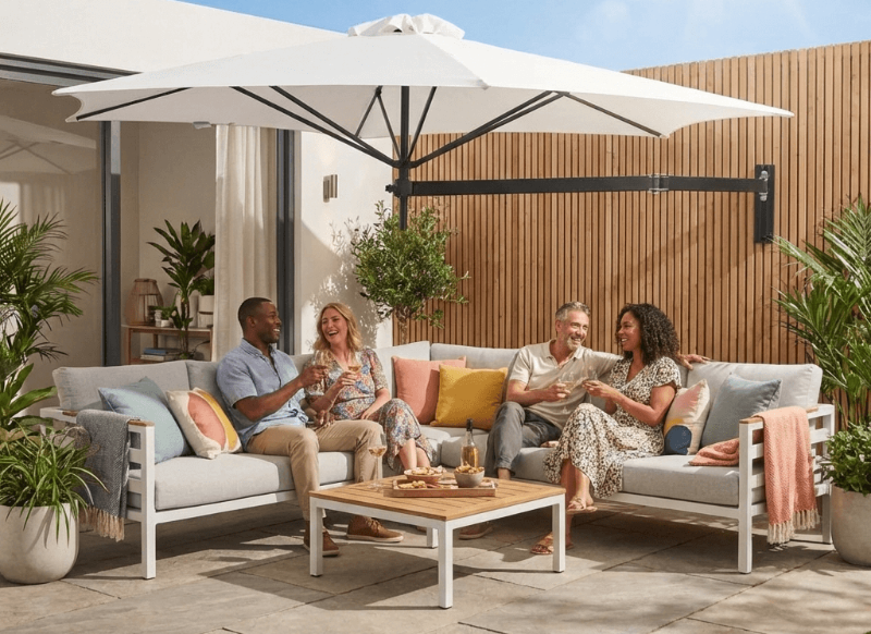 Umbrosa wall mounted umbrella, patio share, people enjoying