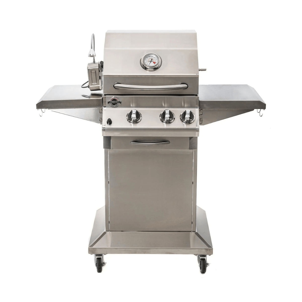 Front view of Jackson Grills 2-burner Lux Series gas grill with extended side shelves, stainless steel construction, and three burner control knobs.