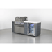 Studio display of the Mont Alpi 4-Burner Stainless Steel Art-wood Outdoor Island Grill with grey wood-effect panels, stainless steel grill, and integrated drinks refrigerator.