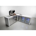 Angled view of the Mont Alpi 400 Deluxe Island with 90-degree corner, built-in gas grill, sink, beverage center, and fridge cabinet with illuminated glass doors.
