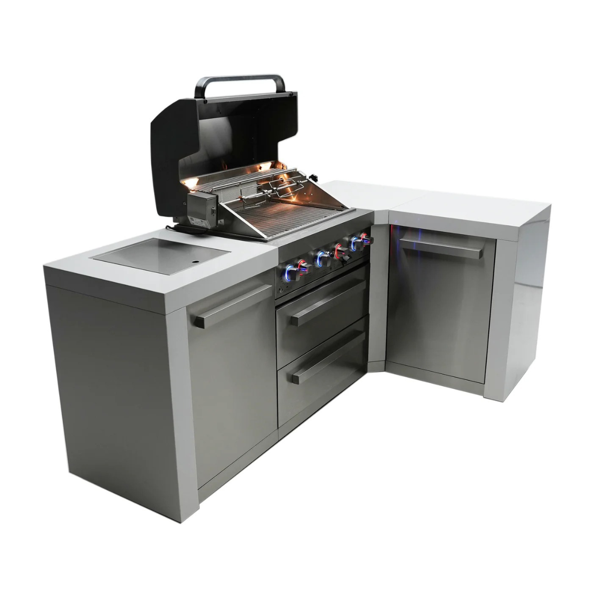 Side-angle view of the Mont Alpi 400 Deluxe Island showcasing the open grill, stainless steel construction, storage door, drawers, and 90-degree corner workspace.