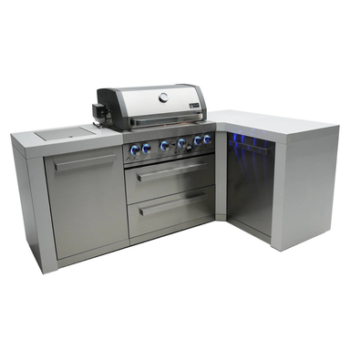 Angled view of the Mont Alpi 400 Deluxe Island featuring a stainless steel gas grill, storage cabinet, double drawers, and integrated 90-degree corner section.