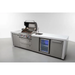Angled view of the Mont Alpi 400 Deluxe Island with the grill hood open, highlighting the cooking area, sink, beverage centre fridge, and stainless steel storage cabinets.