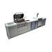 Mont Alpi 400 Deluxe Island with the grill hood open, showcasing the cooking grates, rotisserie system, sink, kegerator, beverage centre, and refrigerated storage.