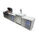 Rear angled view of the Mont Alpi 400 Deluxe Island highlighting the stainless steel finish, sink, kegerator tap tower, beverage centre, and glass-door fridge.