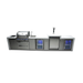 Full front view of the Mont Alpi 400 Deluxe Island with integrated grill, sink, beverage centre, kegerator, storage cabinets, and two illuminated refrigerators.