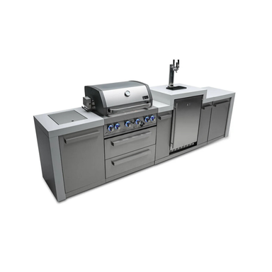 Angled front view of the Mont Alpi 400 Deluxe Island featuring a built-in gas grill, kegerator with dual beer taps, storage drawers, and stainless steel outdoor kitchen cabinetry.