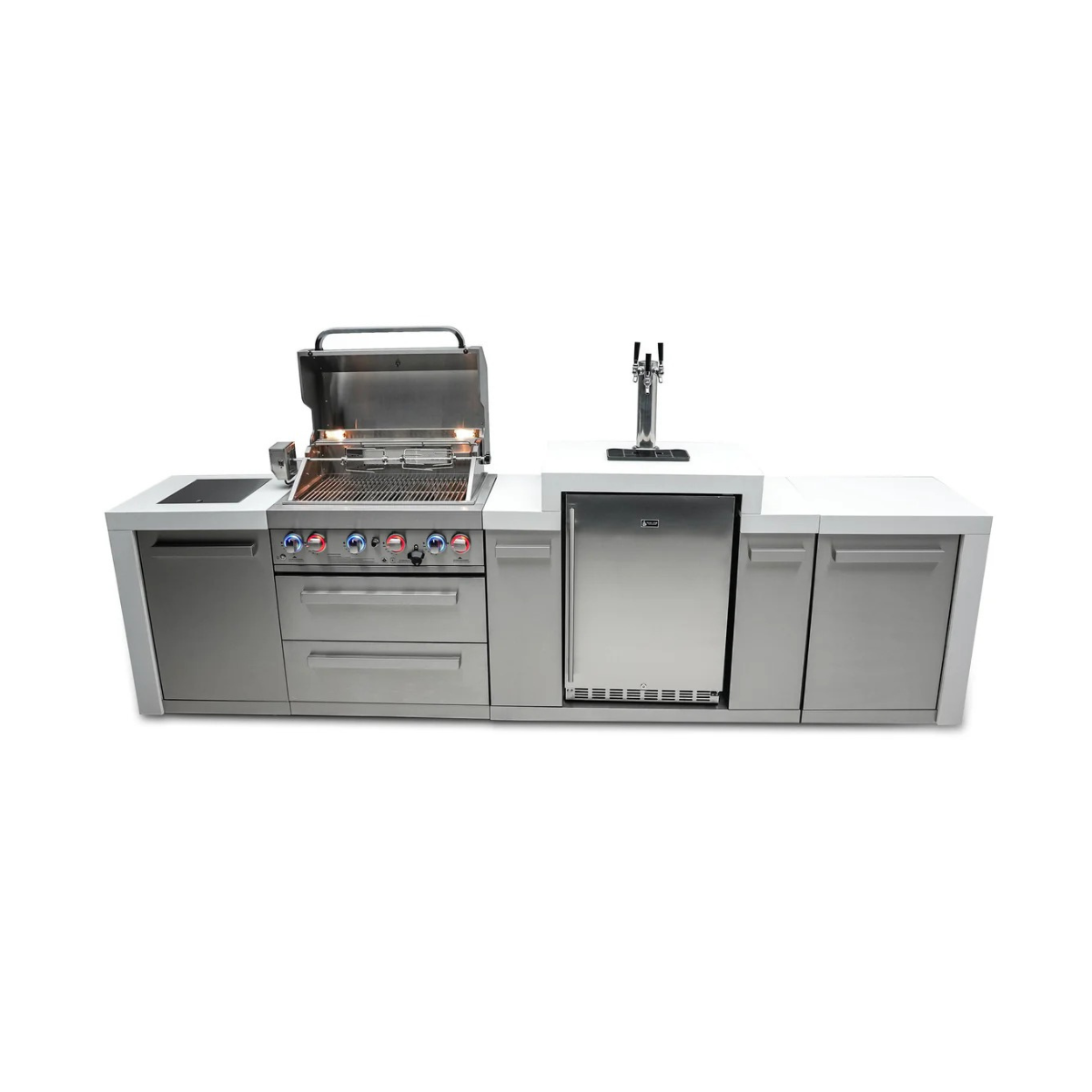Straight-on view of the Mont Alpi 400 Deluxe Island with open grill, illuminated control knobs, kegerator beer tap tower, and multiple stainless steel storage cabinets.