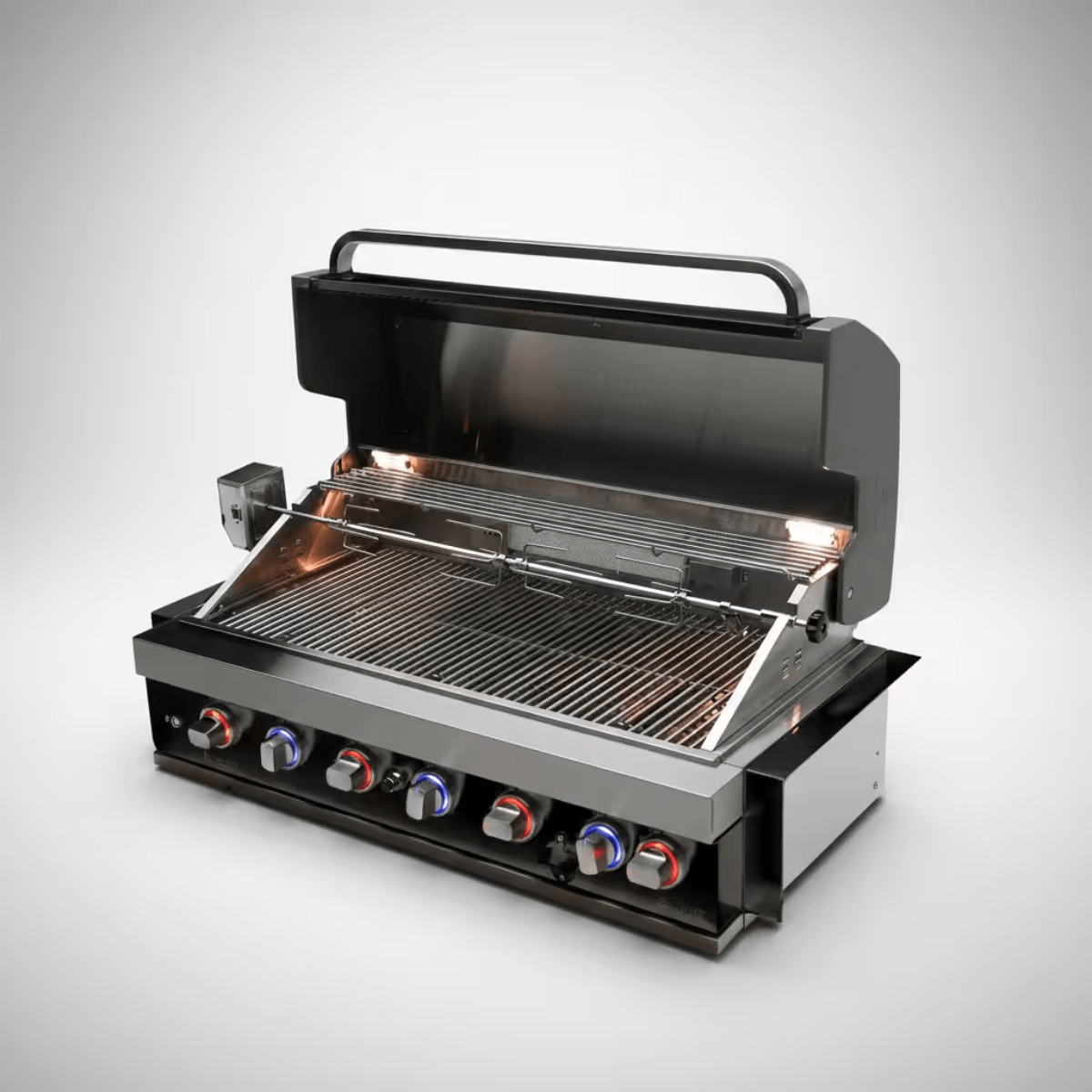 Mont Alpi 44-Inch Black Stainless Steel Built-In Grill with hood open, featuring rotisserie system, warming rack, interior lights, and spacious cooking surface.