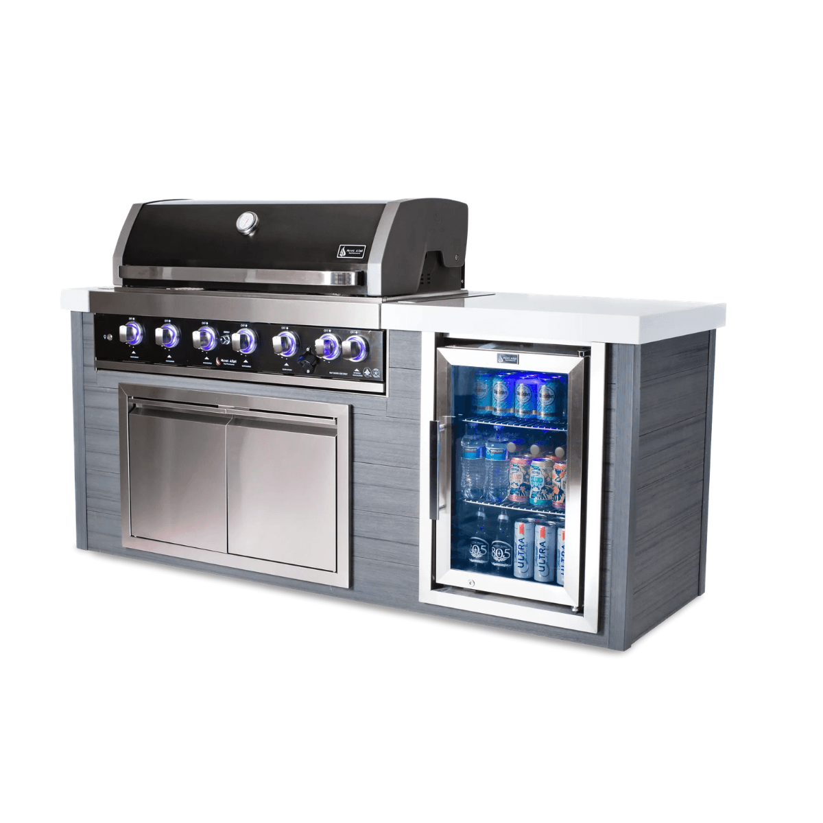 Angled view of the Mont Alpi 6-Burner Black Stainless Steel Art-wood Outdoor Island Grill with illuminated control knobs, double-door storage cabinet, and glass-front beverage refrigerator.