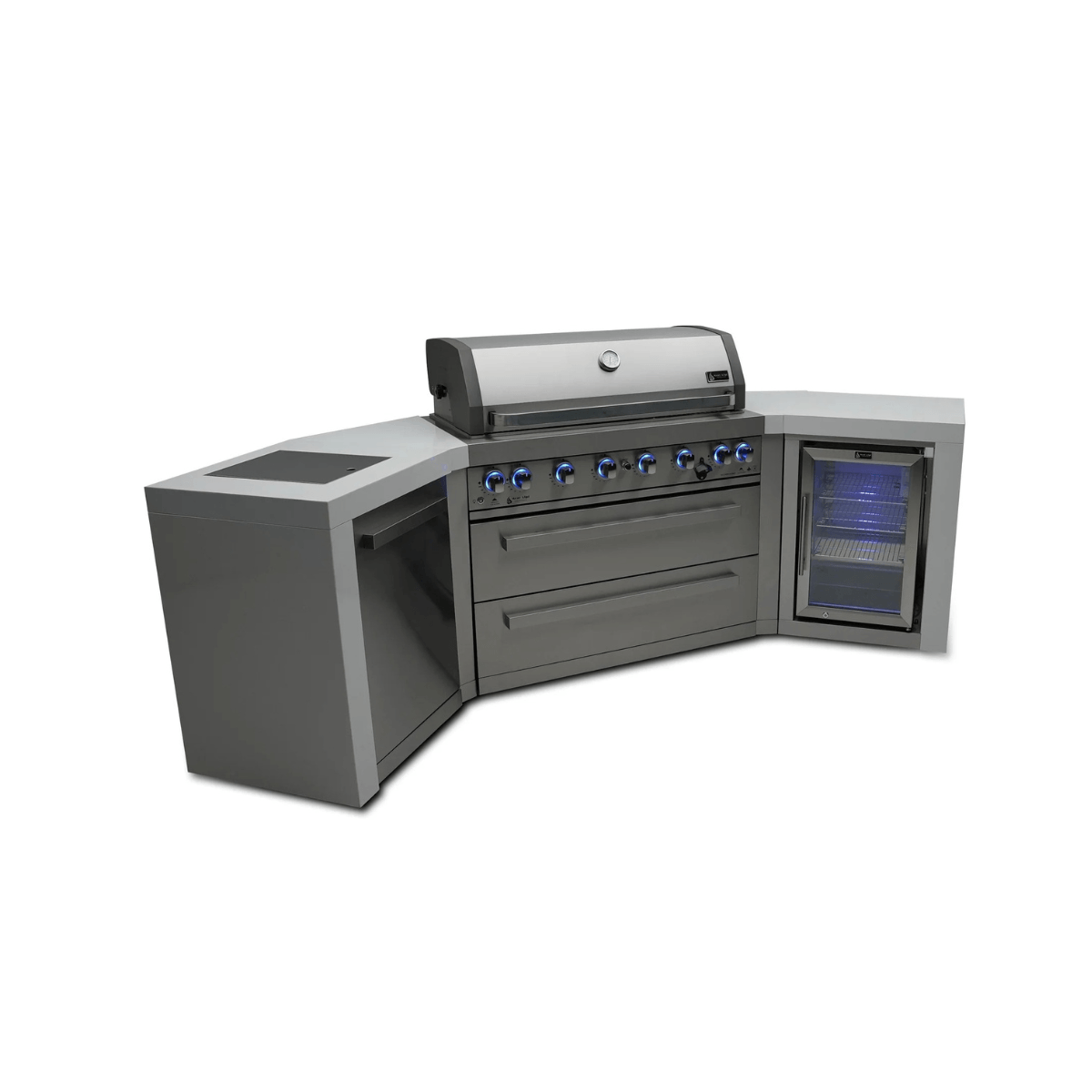 Angled view of the Mont Alpi 805 Deluxe Island with closed grill hood, stainless steel cabinetry, illuminated control knobs, and integrated fridge cabinet.
