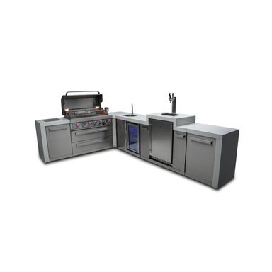 Angled view of the Mont Alpi 805 Deluxe Island with open grill, sink, kegerator, beverage center, and stainless steel storage cabinets.