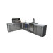 Angled view of the Mont Alpi 805 Deluxe Island with open grill, sink, kegerator, beverage center, and stainless steel storage cabinets.
