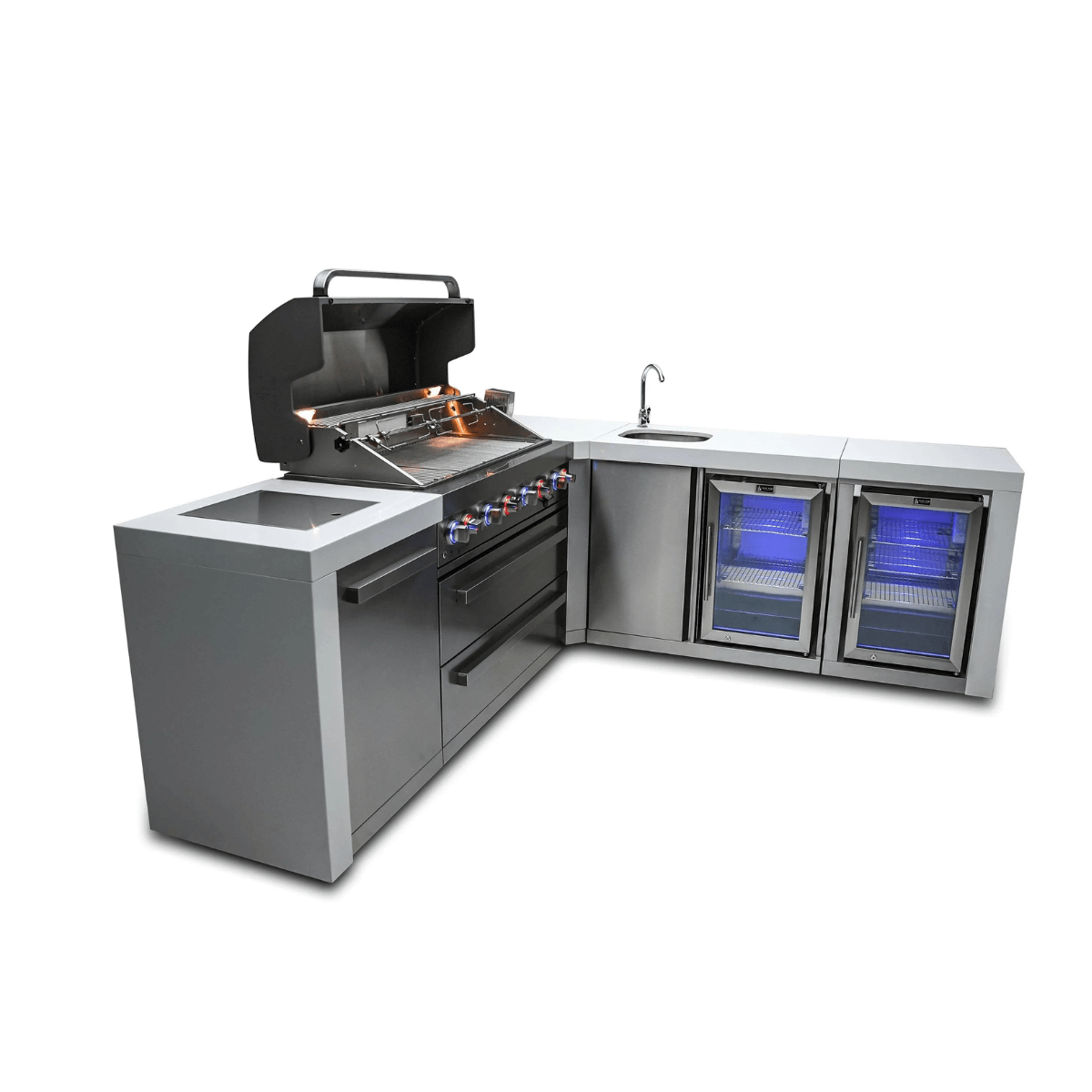 Angled view of the Mont Alpi 805 Deluxe Island with open grill hood, integrated sink, dual glass-door beverage coolers, and stainless steel cabinetry.