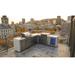L-shaped Mont Alpi 805 Deluxe Island with kegerator, beverage centre, and fridge cabinet on a rooftop terrace overlooking a city skyline.