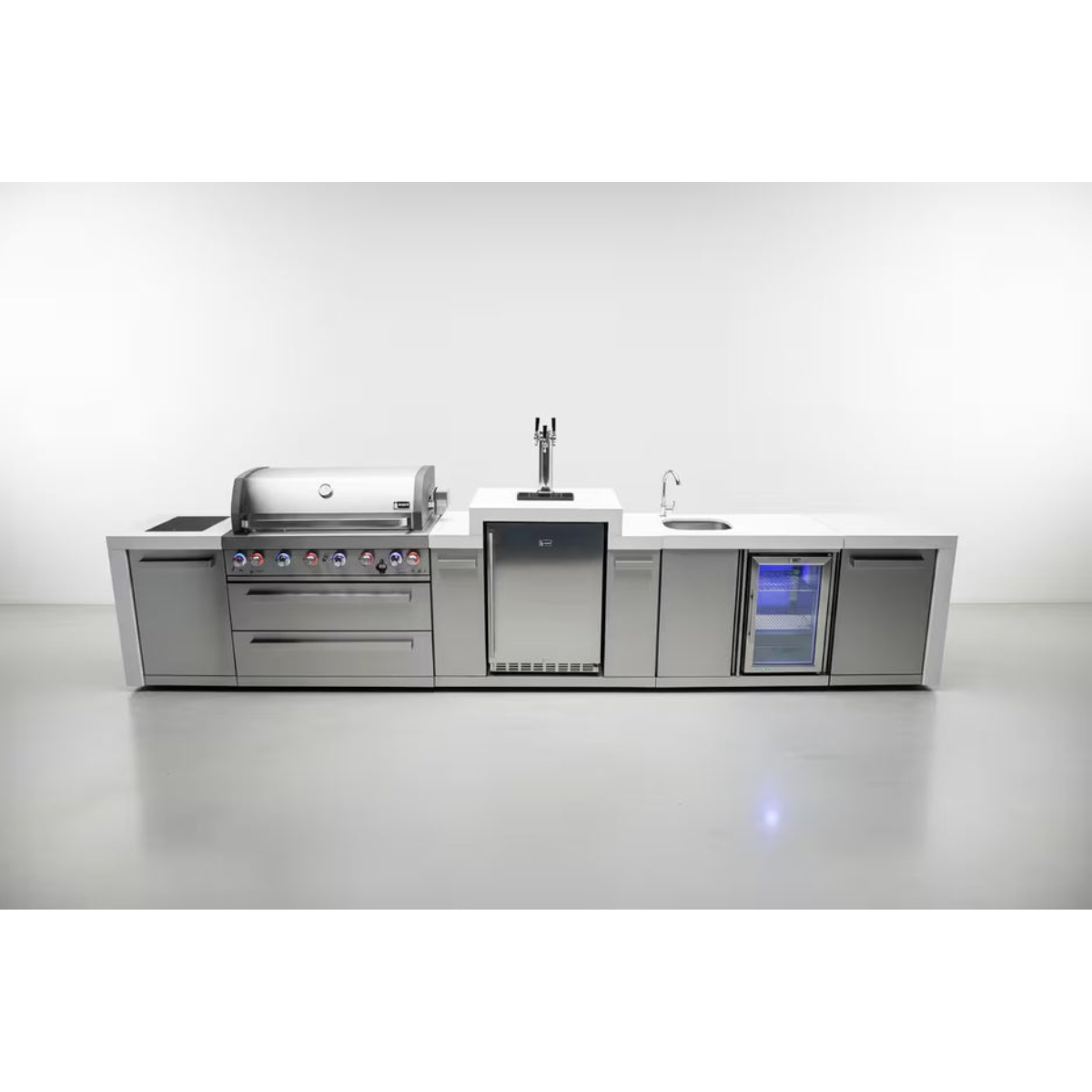 Front view of the Mont Alpi 805 Deluxe Island featuring a built-in grill, kegerator with dual taps, sink, storage cabinets, and beverage center.