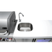 Stainless steel Mont Alpi 805 Deluxe Island with kegerator on a rooftop terrace overlooking a city skyline at night.