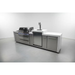 Mont Alpi 805 Deluxe Island with built-in grill, kegerator, storage cabinets, and white stone countertops in a studio setting.
