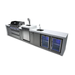 Angled view of the Mont Alpi 805 Deluxe Island featuring a built-in gas grill, kegerator with dual beer taps, sink, storage cabinets, beverage center, and dual glass-door refrigerators.
