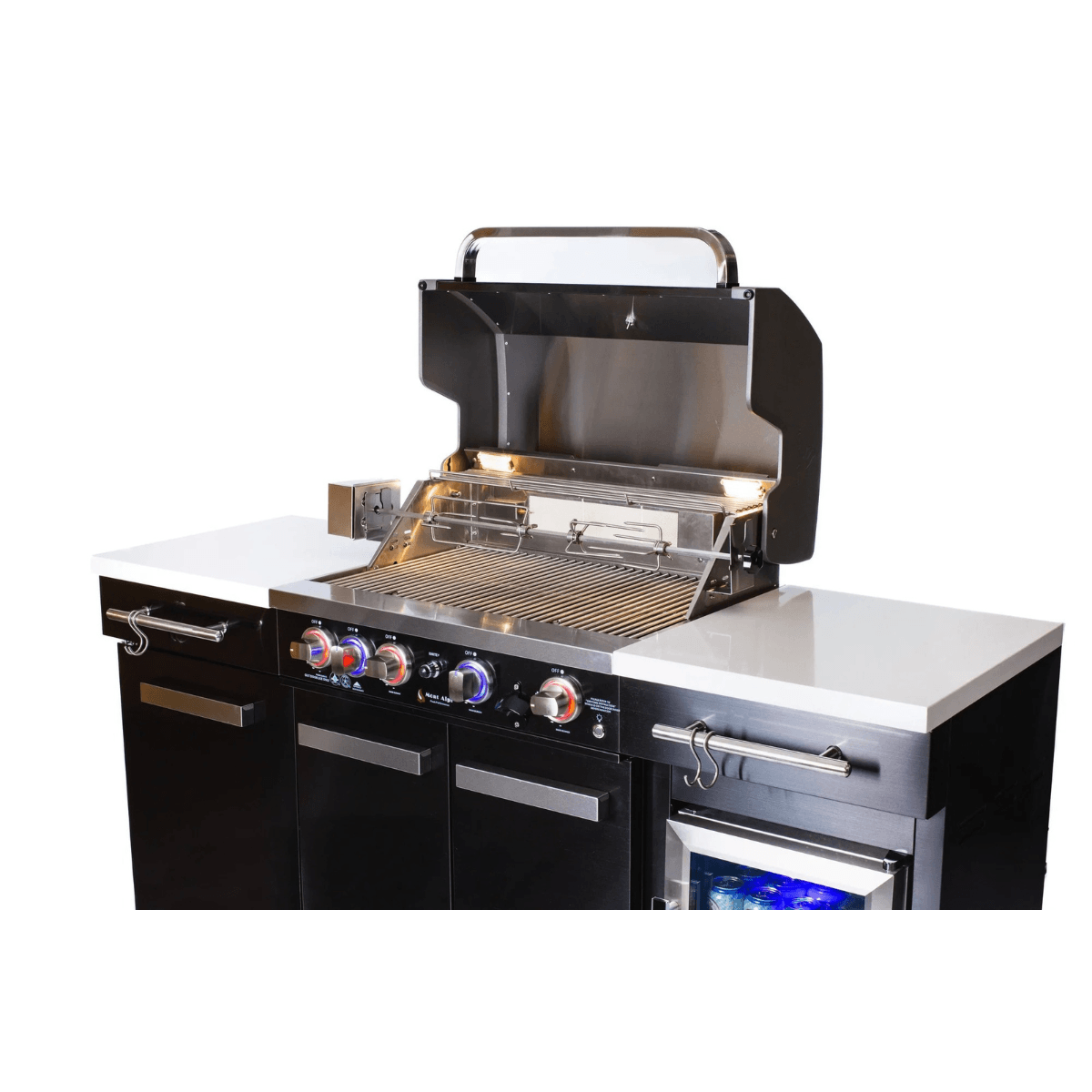 Open grill view of the Mont Alpi 957 Black Stainless Steel Island displaying cooking grates, rotisserie kit, interior lighting, and compact refrigerator.