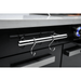 Close-up of the Mont Alpi 957 Island stainless steel utensil rail with hanging hooks mounted on the black cabinet front.