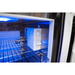 Interior view of the Mont Alpi fridge cabinet showing the temperature control unit and illuminated storage compartment.