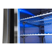 Close-up of the adjustable chrome wire shelves inside the Mont Alpi fridge cabinet with illuminated interior.