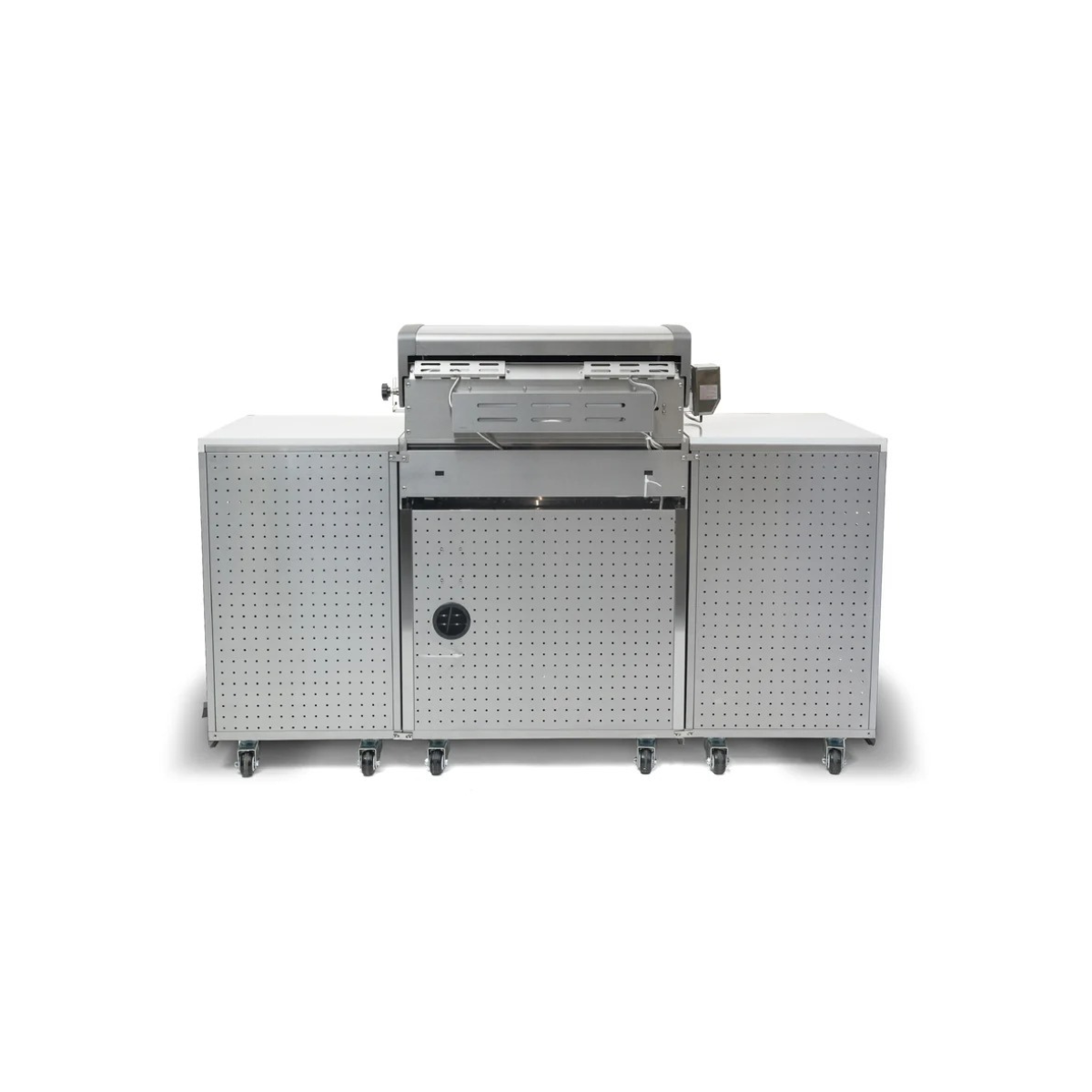 Rear view of the Mont Alpi Compact Island with Refrigerator showing perforated stainless steel back panels, grill housing, and caster wheels.