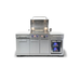 Front view of the Mont Alpi Compact Island with Refrigerator with the grill lid open, revealing stainless steel cooking grates, warming rack, and illuminated controls.
