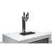 Angled close-up of the stainless steel triple tap dispenser and drip tray on the Mont Alpi Kegerator.
