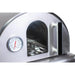 Close-up of the Mont Alpi portable pizza oven front showing the integrated thermometer, viewing window, and sturdy door handle.