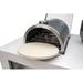 Mont Alpi universal side burner pizza oven with removable ceramic pizza stone positioned outside the cooking chamber for easy cleaning.