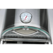 Close-up of the Mont Alpi universal side burner pizza oven showing the built-in temperature gauge and curved glass door handle.