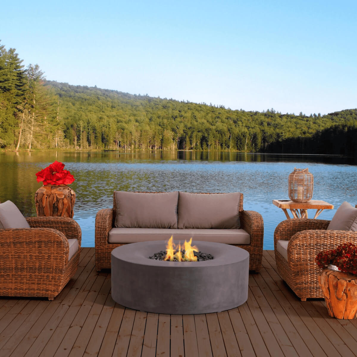 Avalon round  fire pit with outdoor seating and scenic lake backdrop.