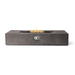 Dark concrete Pyromania Laguna fire table with long linear flame and minimalist outdoor design.