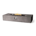 Dark grey Pyromania Laguna fire table with rectangular flame burner and concrete finish.