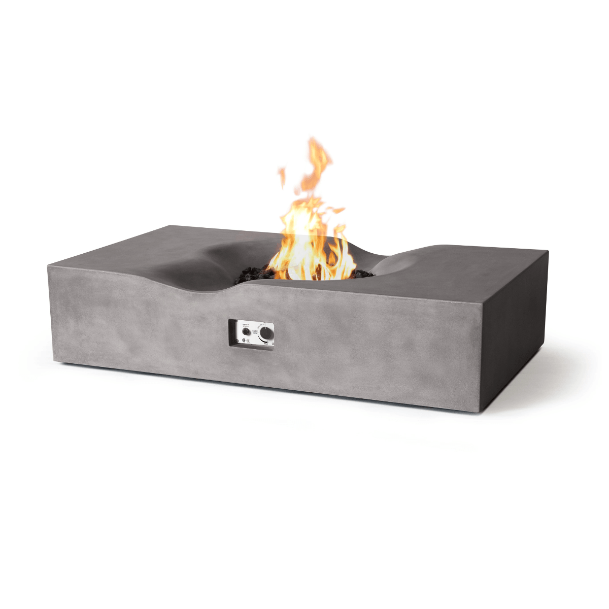 Angled view of the Pyromania Venice concrete fire table with curved recessed burner and flames.
